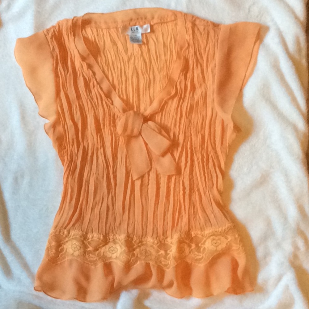 Petite (M) blouse, offers welcomed
